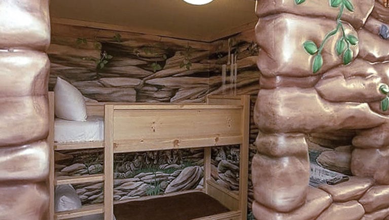 The bunk beds in the Wolf den of the  accessible Grizzly Wolf Den Suite